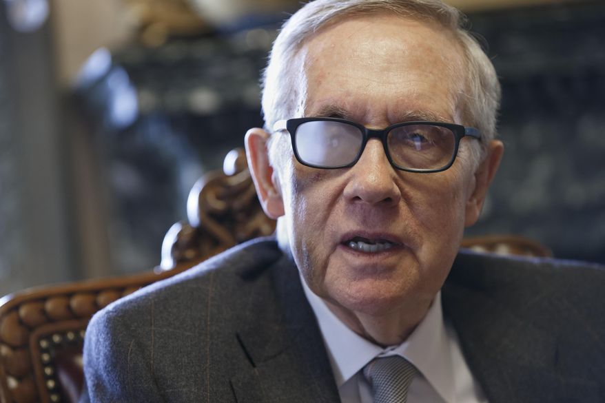 Senate Minority Leader Harry Reid of Nev. talks about his future and the agenda of the Democrats who are now in the minority, Wednesday, March 4, 2015, during an interview with The Associated Press in his office on Capitol Hill in Washington. Reid, 75, is wearing special glasses as part of his recovery from injuries suffered in a violent exercise accident in January.  (AP Photo/J. Scott Applewhite)