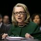 Then-Secretary of State Hillary Rodham Clinton testifies on Capitol Hill in Washington, on the deadly September attack on the U.S. diplomatic mission in Benghazi, Libya, that killed Ambassador J. Christopher Stevens and three other Americans. (AP Photo/Pablo Martinez Monsivais, File)