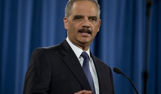Attorney General Eric Holder speaks at the Justice Department in Washington, Wednesday, March 4, 2015, about the Justice Department’s findings related to two investigations in Ferguson, Mo. The Justice Department will not prosecute a white former police officer in the fatal shooting of an unarmed black 18-year-old whose death in Ferguson sparked weeks of protests and ignited an intense national debate over how police treat African-Americans. But the government released a scathing report Wednesday that faulted the city for racial bias. (AP Photo/Carolyn Kaster)