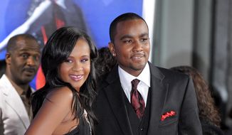 In this Aug. 16, 2012, file photo, Bobbi Kristina Brown, left, and Nick Gordon attend the Los Angeles premiere of &quot;Sparkle&quot; at Grauman&#39;s Chinese Theatre in Los Angeles. (Photo by Jordan Strauss/Invision/AP, File)