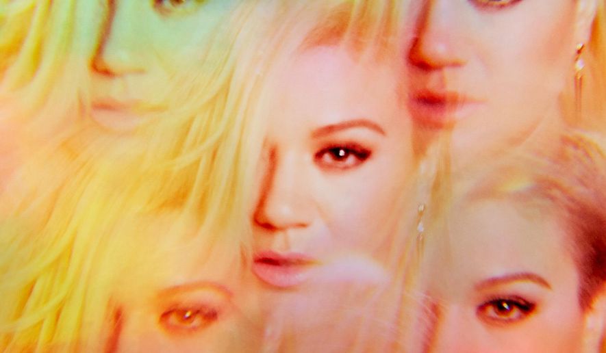 This CD cover image released by RCA/19 shows "Piece By Piece," the latest release by Kelly Clarkson. (AP Photo/RCA 19)
