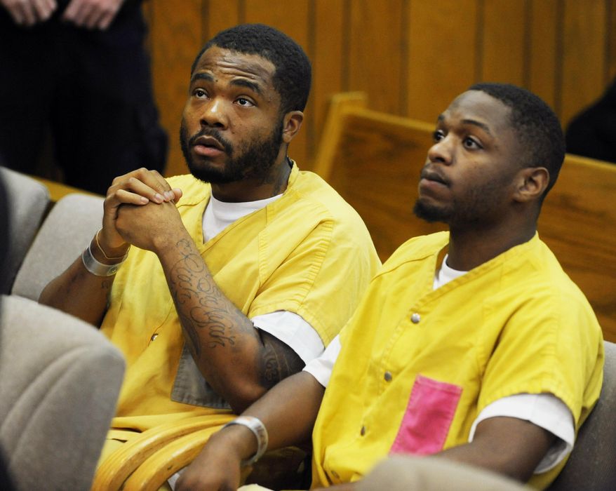 FILE- In a July 16, 2014 file photo, Raphael Hearn, left, and Raymone Jackson sit in court in Inkster, Mich, for a hearing in the case of the execution-style fatal shooting of 2-year-old Kamiya Gross. A Wayne County Circuit Court jury found Jackson guilty Thursday, March 5, 2015, of first-degree murder of Gross. The jury also convicted Hearn of first-degree murder. Prosecutors say Hearn helped Jackson plan and carry out the attack. (AP Photo/The Detroit News, Charles V. Tines, File, Pool)
