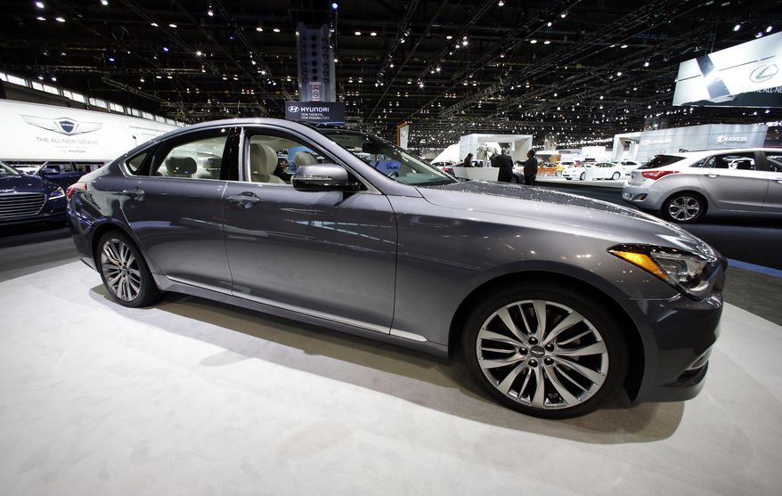 In this Friday, Feb. 7, 2014 photo, the Hyundai 2015 Genesis is displayed during the media preview of the Chicago Auto Show at McCormick Place, in Chicago. Hyundai announced, Friday, March 6, 2015, that the company is recalling more than 26,000 Genesis luxury cars from the 2015 model year in the U.S. and Canada to fix a water leak that can cause the transmission gear shifter to malfunction. (AP photo/Nam Y. Huh)