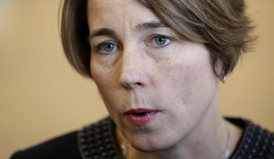 FILE - In this Jan. 22, 2015, file photo, Massachusetts Attorney General Maura Healey speaks with members of the media after testifying before the Massachusetts Gaming Commission in Boston. Healey is filing a brief with the U.S. Supreme Court arguing the Constitution prohibits discrimination against same-sex marriage. Healey has encouraged the testimony of same-sex couples in Massachusetts about how being able to get married in the first state to allow gay marriage has improved their lives. Healey, the first openly gay state attorney general in the country, will argue in a Friday, March 6, 2015, brief that the refusal of some states to license or recognize marriages between gay and lesbian couples inflicts widespread harm to the couples and their families. (AP Photo/Steven Senne, File)