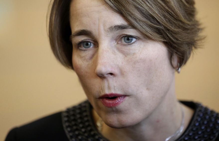 FILE - In this Jan. 22, 2015, file photo, Massachusetts Attorney General Maura Healey speaks with members of the media after testifying before the Massachusetts Gaming Commission in Boston. Healey is filing a brief with the U.S. Supreme Court arguing the Constitution prohibits discrimination against same-sex marriage. Healey has encouraged the testimony of same-sex couples in Massachusetts about how being able to get married in the first state to allow gay marriage has improved their lives. Healey, the first openly gay state attorney general in the country, will argue in a Friday, March 6, 2015, brief that the refusal of some states to license or recognize marriages between gay and lesbian couples inflicts widespread harm to the couples and their families. (AP Photo/Steven Senne, File)