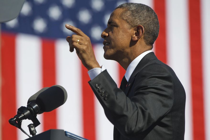 President Barack Obama speaks near the Edmund Pettus Bridge in Selma, Ala., for the 50th anniversary of “Bloody Sunday," a landmark event of the civil rights movement, Saturday, March 7, 2015. (AP Photo/Jacquelyn Martin)