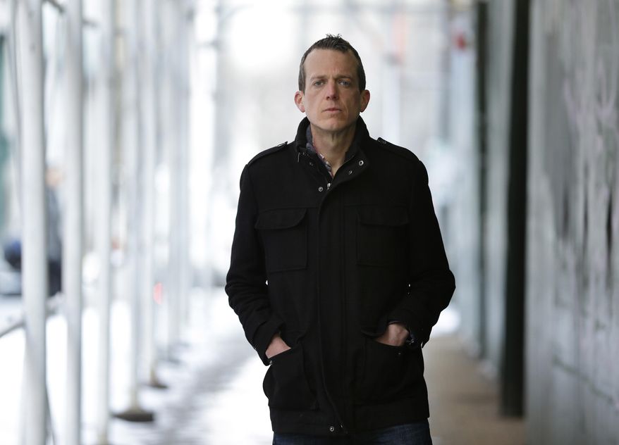 Thomas Hardin poses for a picture in New York, Monday, March 2, 2015. Wearing a wire for nearly seven years, Hardin became a seminal informant in the biggest insider trading case in a generation. (AP Photo/Seth Wenig)