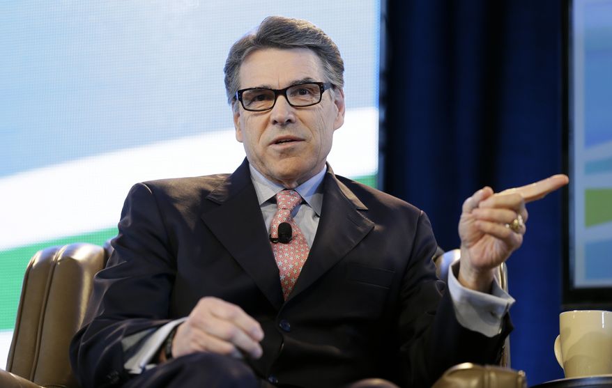 Former Texas Gov. Rick Perry speaks during the Iowa Agriculture Summit, Saturday, March 7, 2015, in Des Moines, Iowa. (AP Photo/Charlie Neibergall)