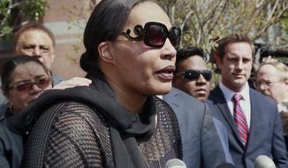 Marvin Gaye&#39;s daughter, Nona Gaye, talks to the media outside the Los Angeles U.S. District Court after a jury awarded the singer&#39;s children nearly $7.4 million after determining singers Robin Thicke and Pharrell Williams copied their father&#39;s music to create &amp;quot;Blurred Lines,&amp;quot; Tuesday, March 10, 2015. Nona Gaye wept as the verdict was read and was hugged by her attorney. (AP Photo/Nick Ut)