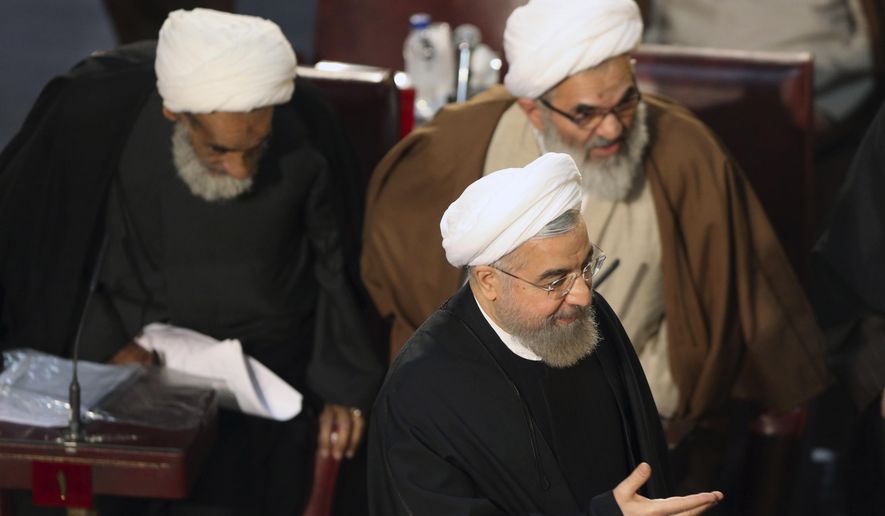 Iranian President Hassan Rouhani, who is also a member of the Assembly of Experts, arrives to attend a biannual meeting of the assembly in Tehran, Iran, Tuesday, March 10, 2015. Iran&#x27;s most influential clerical body charged with choosing or dismissing the nation&#x27;s supreme leader has elected a hard-line ayatollah as its new chairman, the official IRNA news agency reported on Tuesday. IRNA said Mohammad Yazdi, the deputy chairman of the 86-member Assembly of Experts, got 47 votes in his favor from among 73 clerics who attended the session. (AP Photo/Vahid Salemi)