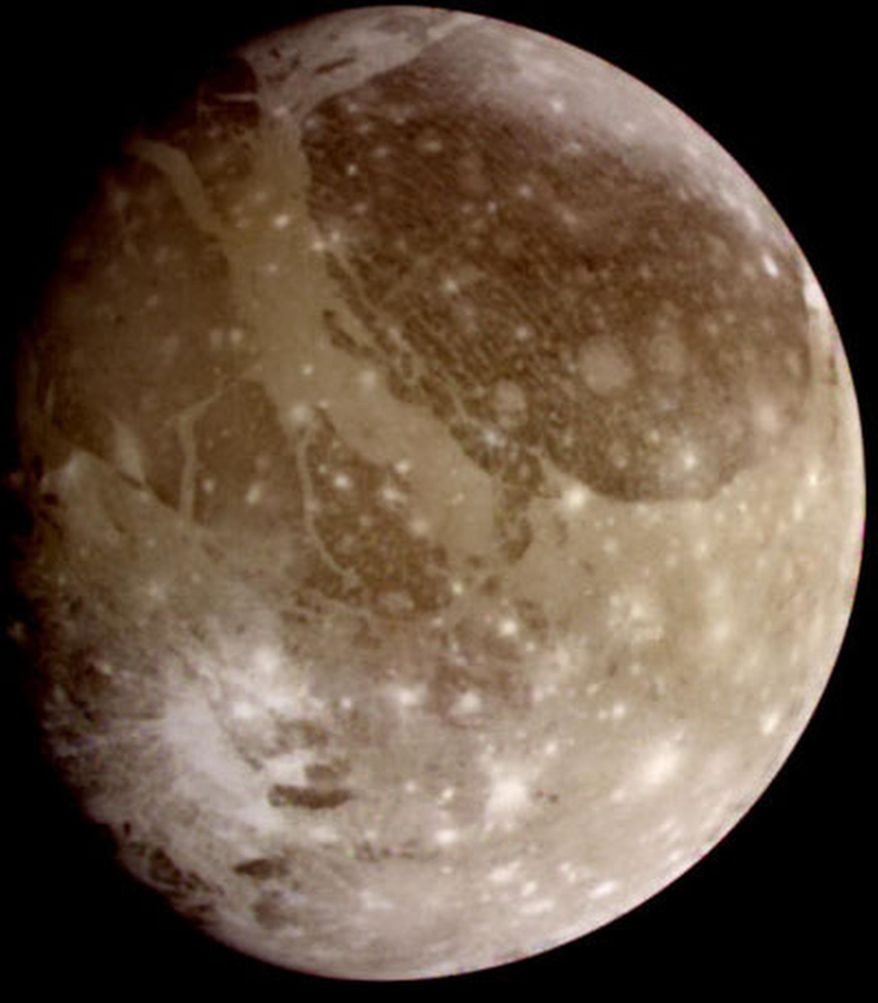 This June 2000 image provided by NASA taken by NASA’s Galileo spacecraft shows Ganymede, Jupiter’s largest moon. Scientists reported Thursday, March 12, 2015 there’s evidence of an ocean beneath the icy surface of Ganymede based on new observations by the Hubble Space Telescope. (AP Photo/NASA)