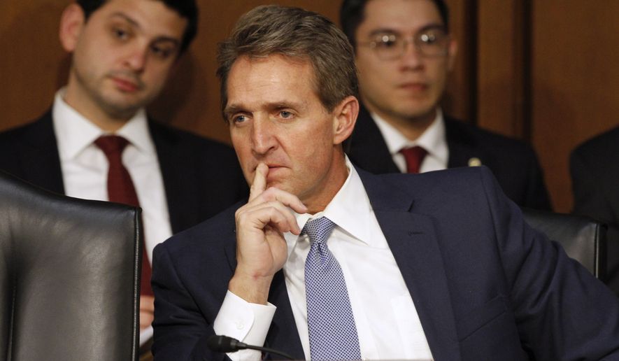Sen. Jeff Flake, R-Ariz., listens during a Senate Judiciary Committee hearing on Capitol Hill in Washington in this Jan. 28, 2015, file photo. (AP Photo/Jacquelyn Martin) ** FILE **