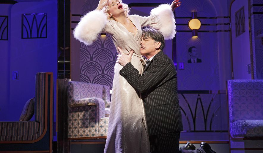 This image released by Polk PR shows Kristen Chenoweth, left, and Peter Gallagher during a performance of the Roundabout Theatre Company's "On The Twentieth Century," in New York. (AP Photo/Polk PR, Joan Marcus)