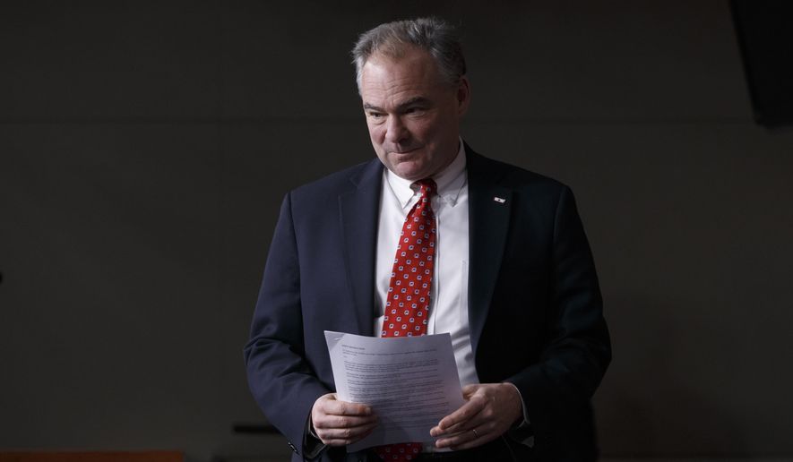 FILE - In this Feb. 11, 2015, file photo, Sen. Tim Kaine, D-Va., arrives for a news conference on President Barack Obama&#39;s request to Congress to authorize military force against Islamic State fighters at the Capitol in Washington. Republicans now in charge in Congress offer their budget blueprint the week of March 16 with the pledge to balance the nation’s budget within a decade and rein in major programs such as food stamps and Medicare.  More pressing for many Republicans, however, is easing automatic budget cuts set to slam the military.  (AP Photo/J. Scott Applewhite, File)