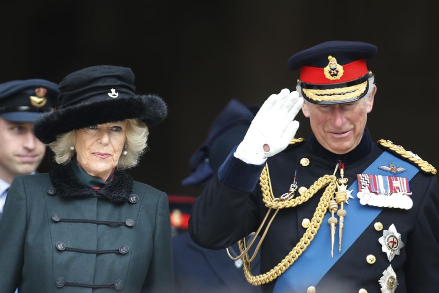 FILE - In this Friday, March 13, 2015, file photo, Britain's Prince Charles, right, and the Duchess of Cornwall leave St Paul’s Cathedral, in central London, after attending a service of commemoration to pay tribute to members of the British armed forces, past and present, who served on operations in Afghanistan. Prince Charles and his wife, Camilla, are set to arrive in Washington on Tuesday, March 17, 2015, and will visit cultural and educational sites over the course of three days. (AP Photo/Lefteris Pitarakis, File)