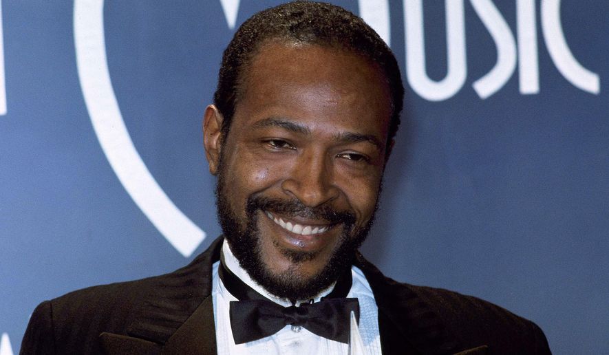 FILE - In this Jan. 17, 1983 file photo, singer-songwriter Marvin Gaye, winner of Favorite Soul/R&amp;amp;B Single, &amp;quot;Sexual Healing,&amp;quot; attends the American Music Awards in Los Angeles. The singer&#x27;s family is seeking to stop the distribution of “Blurred Lines.” Gaye’s children filed a motion in court Tuesday, March 17, 2015, to prevent the copying, distributing and performing of the hit song featuring Pharrell, Robin Thicke and T.I.  (AP Photo/Doug Pizac, File)