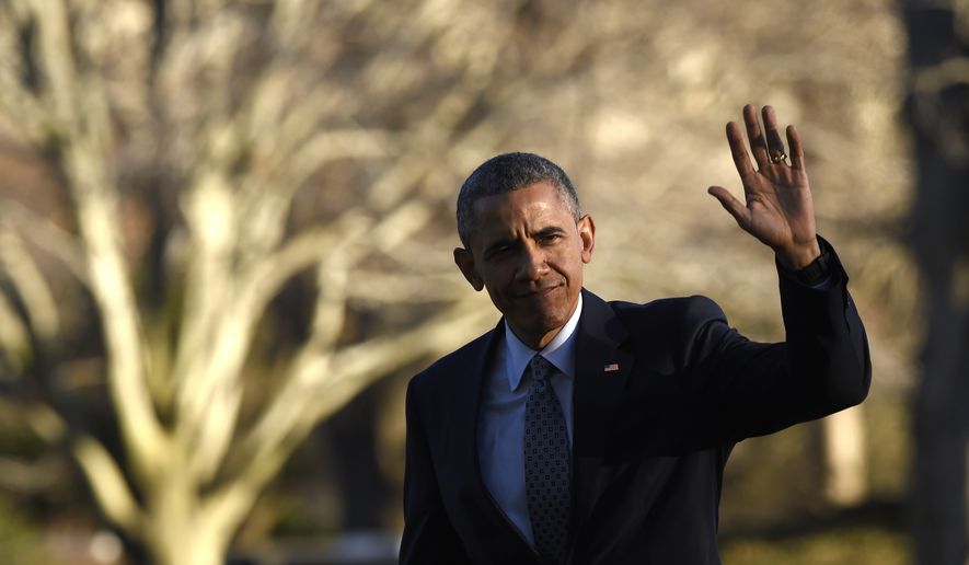 President Barack Obama waves after stepping of Marine One helicopter on the South Lawn of the White House in Washington, Wednesday, March 18, 2015, after returning from a trip to Cleveland where he spoke about the importance of middle class economics to the City Club of Cleveland. (AP Photo/Susan Walsh)