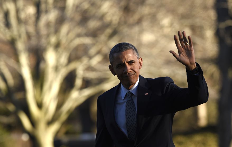 President Barack Obama waves after stepping of Marine One helicopter on the South Lawn of the White House in Washington, Wednesday, March 18, 2015, after returning from a trip to Cleveland where he spoke about the importance of middle class economics to the City Club of Cleveland. (AP Photo/Susan Walsh)