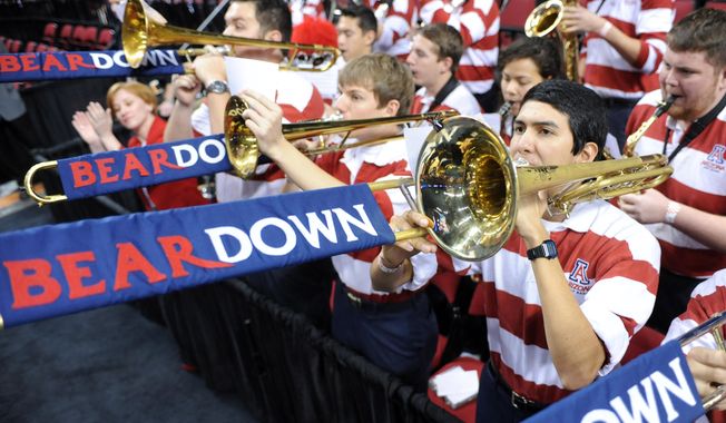 The Arizona band plays during the first half against Texas Southern in the second round of the NCAA college basketball tournament in Portland, Ore., Thursday, March 19, 2015. (AP Photo/Greg Wahl-Stephens)