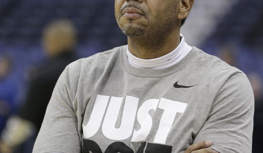 Providence head coach Ed Cooley watches during practice at the NCAA college basketball tournament in Columbus, Ohio, Thursday, March 19, 2015.  Providence plays Dayton in the second round on Friday. (AP Photo/Tony Dejak)