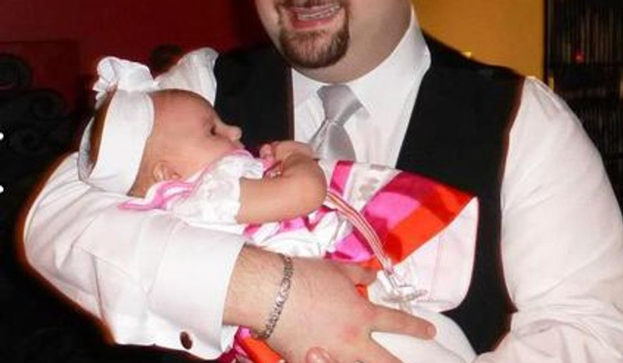 This undated photo provided by Joey DiJulio of Burien, Wash. on Thursday, March 19, 2015 shows him holding a child. For weeks, the suburban Seattle man found himself getting emails from people he didn&#39;t know about a bachelor party and a groom he&#39;s never met. It turns out DiJulio had been mistaken for a friend of the groom with a similar last name. On Monday, 16, 2015, he broke the news after the groom&#39;s brother wanted a headcount of people attending the party. The groom Jeff Minetti, 34, figured: Why not still invite him? (AP Photo/Joey DiJulio)