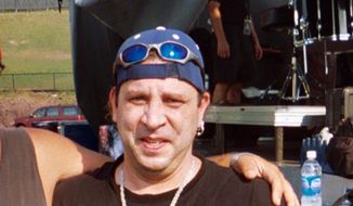 This Aug. 21, 2005, photo shows Twisted Sister drummer A.J. Pero before a concert in Little Falls, N.J. Pero died of an apparent heart attack on Friday, March 20, 2015, while touring with Adrenaline Mob, a group with which he played in between engagements with Twisted Sister. He was 55. (AP Photo/Wayne Parry)