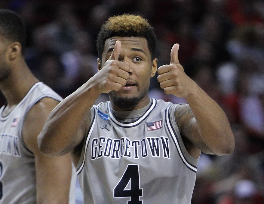 Georgetown guard D&#x27;Vauntes Smith-Rivera gestures during the second half of an NCAA college basketball second round game against Eastern Washington in Portland, Ore., Thursday, March 19, 2015. Smith-Rivera scored 25 points as Georgetown won 84-74. (AP Photo/Craig Mitchelldyer)