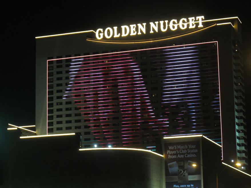 This Aug. 31, 2012 photo shows the Golden Nugget casino in Atlantic City, N.J. On Friday, March 20, 2015, a group of 14 gamblers asked a judge to let them keep $1.5 million they won in 2012 when the casino unknowingly used unshuffled cards that kept coming out in a specific pattern. Last month the judge ruled the gamblers must return the money. (AP Photo/Wayne Parry)
