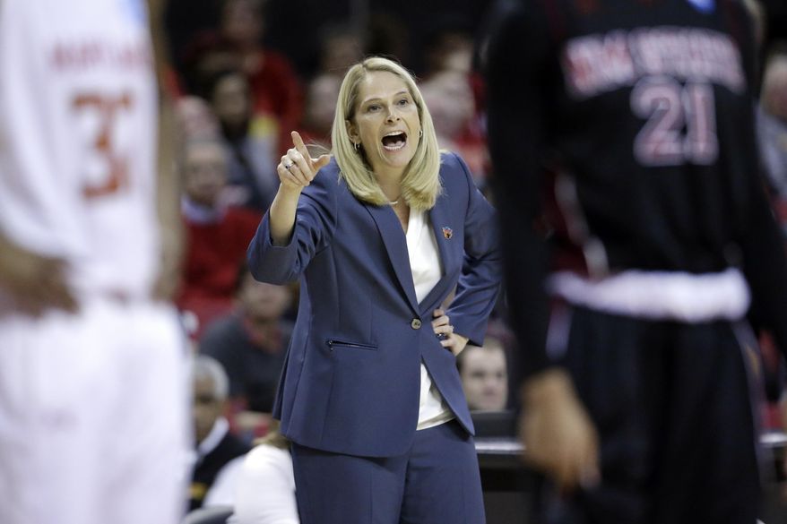Maryland head coach Brenda Frese directs her players in the first half of an NCAA college basketball game against New Mexico State in the first round of the NCAA tournament, Saturday, March 21, 2015, in College Park, Md. (AP Photo/Patrick Semansky)