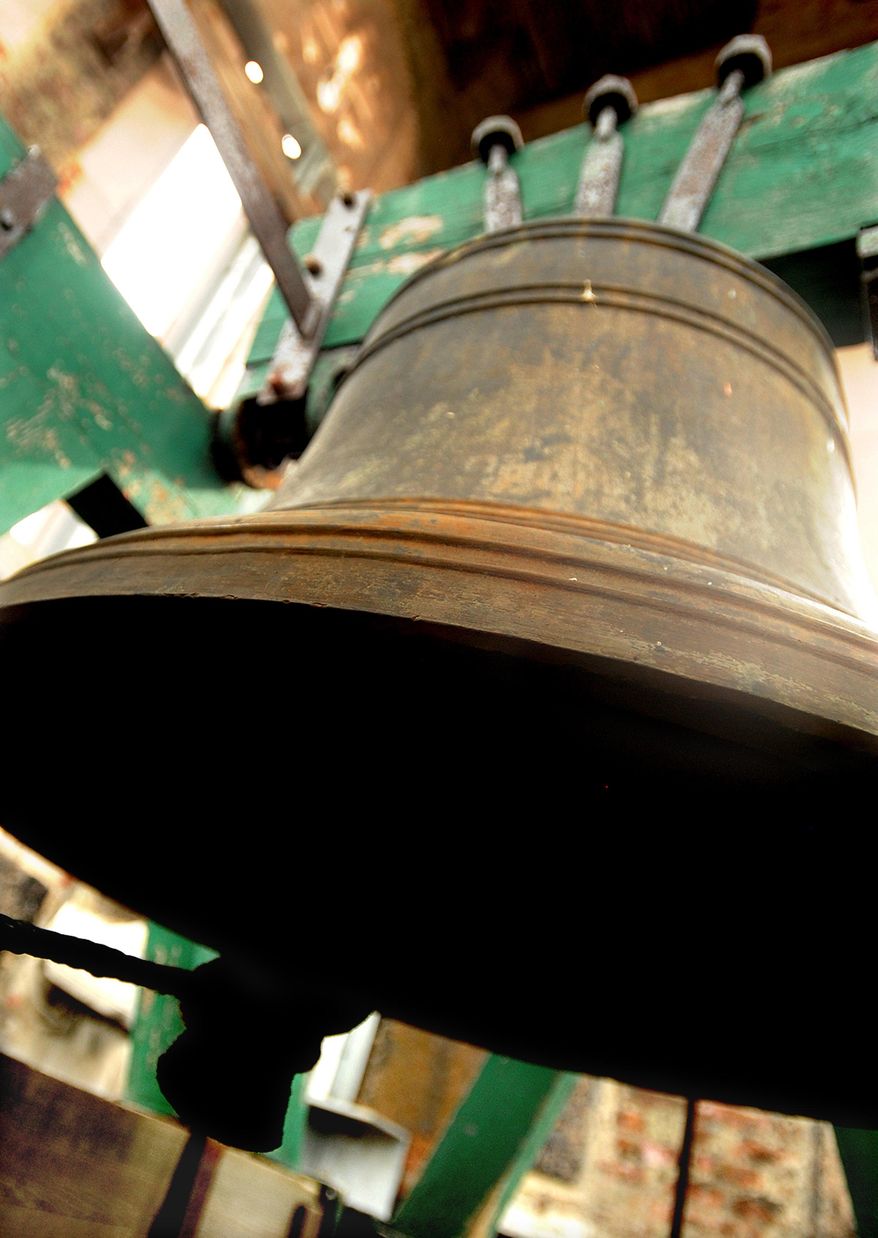 MEMBER EXCHANGE ADVANCE FOR SUNDAY, MARCH 22, 2015 - In this undated photo the First Congregational Church's big bell sits motionless in its bell tower in Fall River, Mass. Fall River has always been a city of bells, from the Durfee bells, just recently restored, to the bells in church steeples that, though their ranks grow thinner every year, still dot the city like chips of brighter stone dot its famous gray granite. There were bells in some of the city's mills. (AP Photo/Herald News, Jack Foley)