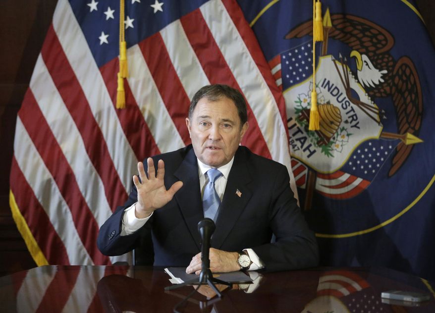 FILE - In this Feb. 5, 2015, file photo, Utah Gov. Gary Herbert speaks to members of the media during a news conference at the Utah State Capitol, in Salt Lake City. Utah became the only state to allow firing squads for executions Monday when Herbert signed a law approving the controversial method's use when no lethal-injection drugs are available. Herbert has said he finds the firing squad "a little bit gruesome," but Utah is a capital punishment state and needs a backup execution method in case a shortage of the drugs persists. (AP Photo/Rick Bowmer, File)