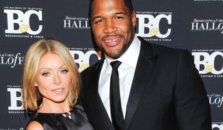 FILE - In this Oct. 28, 2013 file photo, honorees Kelly Ripa and Michael Strahan, co-hosts of &quot;Live with Kelly and Michael,&quot; attend the 23rd Annual Broadcasting &amp;amp; Cable Hall of Fame Awards in New York. The hosts announced Monday, March 23, 2015, that their program will head to the nation’s capital for this year’s White House Easter Egg Roll. The show will air live for the entire hour April 6 from the Jacqueline Kennedy Garden outside the East Wing of the White House. (Photo by Evan Agostini/Invision/AP, File)