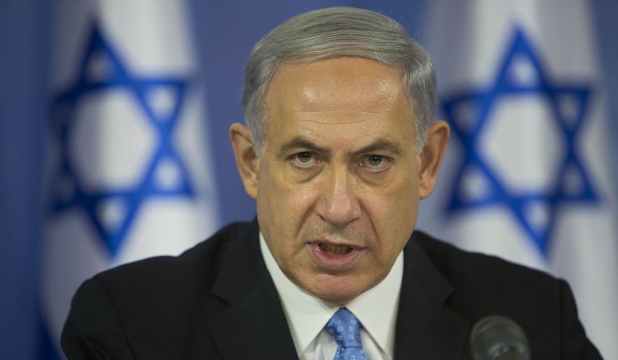 Israel Prime Minister Benjamin Netanyahu sought to dial back his pre-election rhetoric, telling an audience in Jerusalem that he is aware that his comments had &quot;hurt some citizens of Israel&quot; and that he was &quot;sorry.&quot; In urging his supporters to get out and vote, he had said Arabs were voting in &quot;droves&quot; in an effort to oust him from office. (Associated Press)