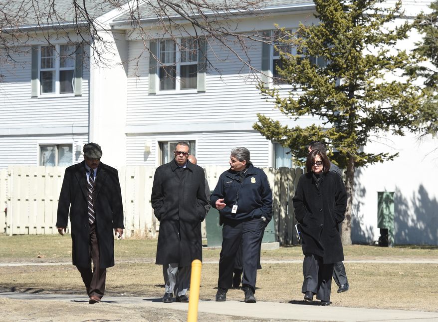 Detroit Police Chief James Craig and other law enforcement have a short briefing to media as law enforcement investigates in Detroit where the bodies of 2 children described as pre-teens or teens were found in a freezer, Tuesday, March 24, 2015 by 36th District Court officers carrying out an eviction at the Martin Luther King Apartments. Their names were not immediately released. Autopsies will be performed by the Wayne County medical examiner's office to determine how they died. WXYZ-TV reports that two other children, ages 11 and 17, have been taken from the home and placed with protective services.