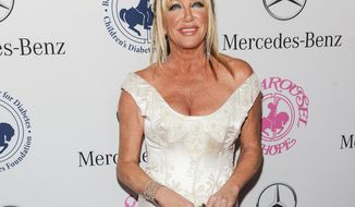 FILE - In this Oct. 11, 2014 file photo, Suzanne Somers arrives at the 2014 Carousel Of Hope Ball, in Beverly Hills, Calif. The television personality Somers is bringing a nightclub act to Las Vegas starting in May 2015. Westgate Las Vegas officials announced this week that the “Dancing with the Stars” contestant will perform a 70-minute musical show dubbed “Suzanne Sizzles” that promises a Rack Pack-era cabaret vibe in an intimate venue at the casino-hotel. (Photo by Richard Shotwell/Invision/AP, File)