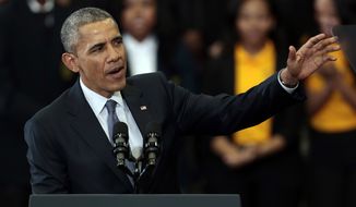 President Barack Obama speaks about payday lending and the economy, Thursday, March 26, 2015, at Lawson State Community College in Birmingham, Ala.  (AP Photo/Butch Dill)