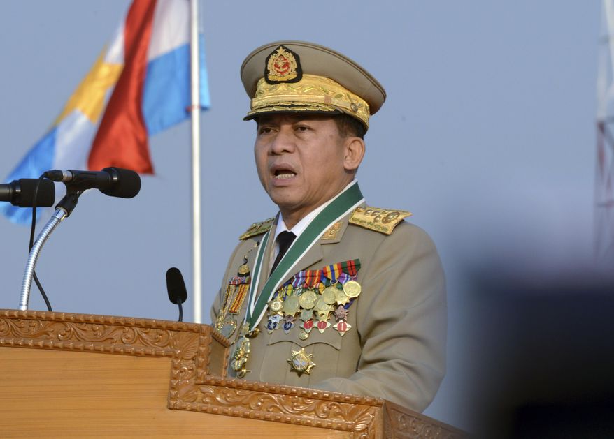 Myanmar's Commander-in-chief Senior Gen. Min Aung Hlaing speaks during a ceremony to mark the 70th anniversary of Armed Forces Day in Naypyitaw, Myanmar, Friday, March 27, 2015. Myanmar's powerful army commander has pledged to work to support successful elections in November and warned that the army will not tolerate instability or armed threats. (AP Photo/Khin Maung Win)