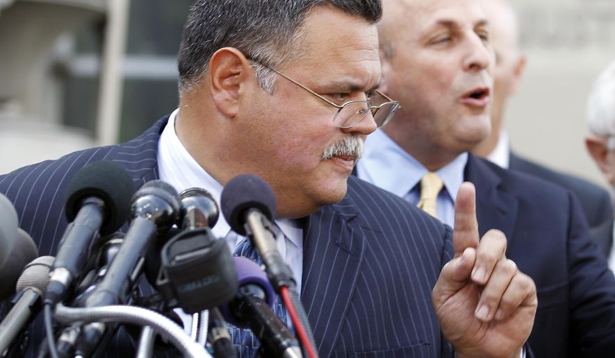 FILE - In this May 26, 2010, file photo, Tucson Police Chief Roberto Villasenor, gestures during a news conference outside the Justice Department in Washington. Villasenor, writing as chief of the Arizona Association of Chiefs of Police has sent a letter to Gov. Doug Ducey urging him to veto a bill requiring police to keep the names of officers involved in shootings secret for two months. (AP Photo/Jose Luis Magana)