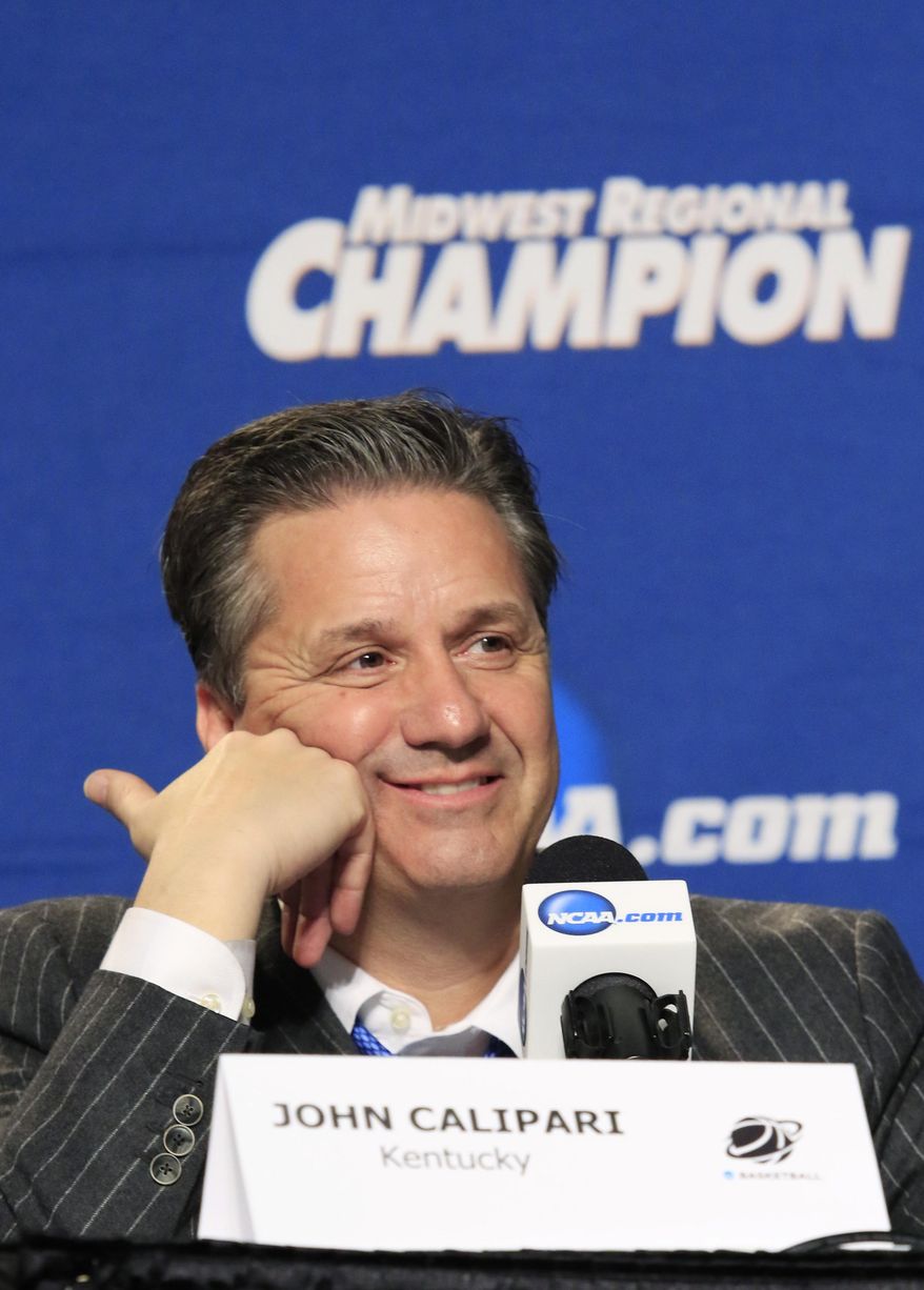 Kentucky coach John Calipari smiles during his news conference after Kentucky's 68-66 win over Notre Dame in a college basketball game in the NCAA men's tournament regional finals, Saturday, March 28, 2015, in Cleveland. (AP Photo/Aaron Josefczyk)