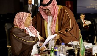 Saudi Foreign Minister Saud bin Faisal bin Abdulaziz Al Saud reviews a document during an Arab foreign ministers meeting in Sharm el-Sheikh, South Sinai, Egypt, Sunday, March 29, 2015. Arab League member states at a summit in this Red Sea resort have agreed in principle to form a joint inter-Arab military peacekeeping force. The agreement is a telling sign of a new determination among Saudi Arabia, Egypt and their allies to intervene aggressively in regional hotspots, whether against Islamic militants or spreading Iranian power. (AP Photo/Thomas Hartwell)