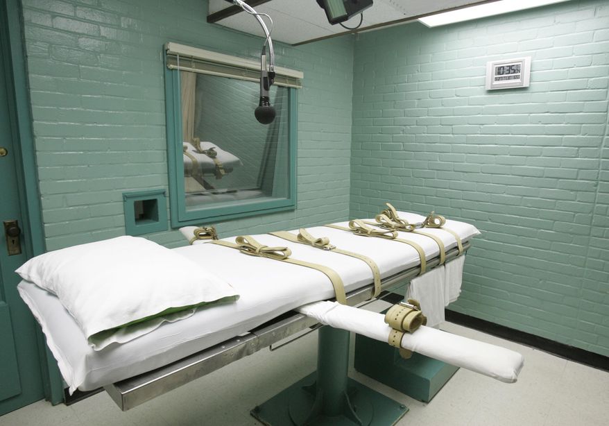 FILE - This May 27, 2008 file photo shows the State of Texas execution chamber in Huntsville, Texas. A leading association for pharmacists on Monday has approved a proposal declaring that participation in lethal injection executions by compounding pharmacies would be a violation of core pharmacy values. (AP Photo/Pat Sullivan, File)