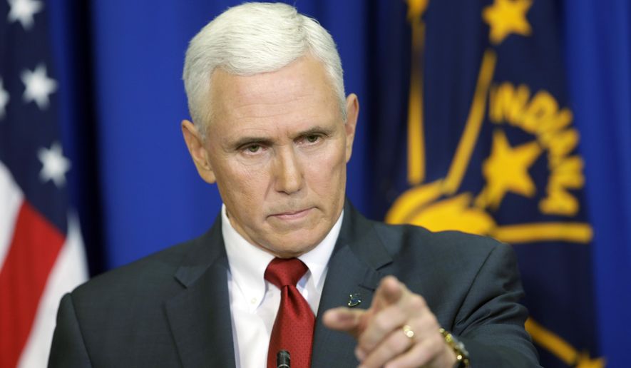 Indiana Gov. Mike Pence takes a question during a news conference, Tuesday, March 31, 2015, in Indianapolis. Pence said that he wants legislation on his desk by the end of the week to clarify that the state&#x27;s new religious-freedom law does not allow discrimination against gays and lesbians. (AP Photo/Darron Cummings)