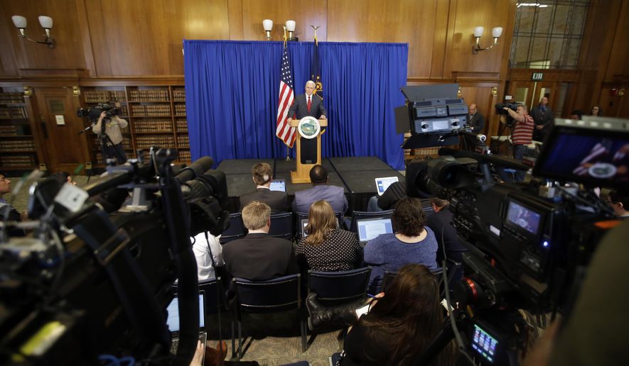 Indiana Gov. Mike Pence speaks during a news conference, Tuesday, March 31, 2015, in Indianapolis. Pence said that he wants legislation on his desk by the end of the week to clarify that the state's new religious-freedom law does not allow discrimination against gays and lesbians. (AP Photo/Darron Cummings)