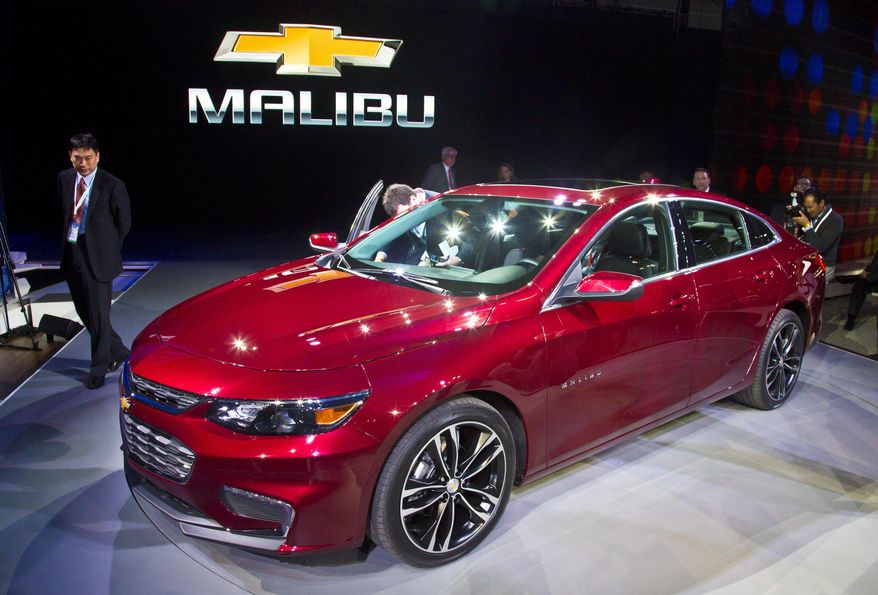 The 2016 Chevrolet Malibu Hybrid, which uses technology from the Chevrolet Volt, is introduced at the New York International Auto Show, Wednesday, April 1, 2015. The Malibu Hybrid is expected to offer an estimated 48 mpg city, 45 mpg highway. (AP Photo/Bebeto Matthews)