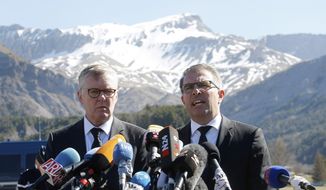 CEO of Germanwings Thomas Winkelmann, left, and Lufthansa CEO Carsten Spohr attend a press conference near the site of the Germanwings jet crash, in Le Vernet, France, Wednesday, April 1, 2015. (AP Photo/Claude Paris)