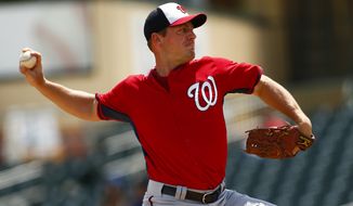 Washington Nationals starting pitcher Jordan Zimmermann (27) works in the first inning of an exhibition spring training baseball game against the Miami Marlins Wednesday, April 1, 2015, in Jupiter, Fla. (AP Photo/John Bazemore)
