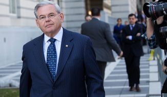 Sen. Bob Menendez, New Jersey Democrat, leaves federal court in Newark, New Jersey, after pleading not guilty to sweeping corruption charges. He is accused of using his office to improperly benefit an eye doctor and political donor. (Associated Press)