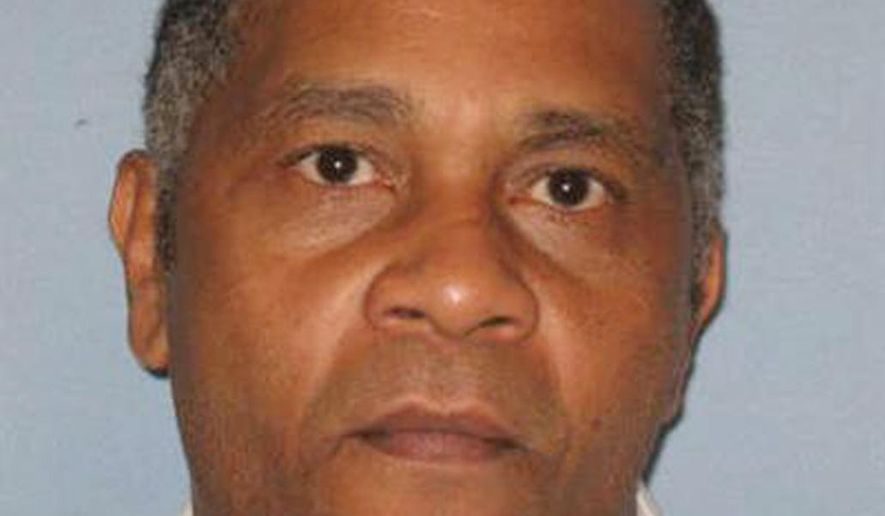 In this undated photo made available by the Alabama Department of Corrections, shows inmate Anthony Ray Hinton. Hinton, who spent nearly 30 years on death row will go free Friday, April 3, 2015, after prosecutors told a court that there is not enough evidence to link him to the 1985 murders he was convicted of committing. (AP Photo/Alabama Dept. of Corrections)
