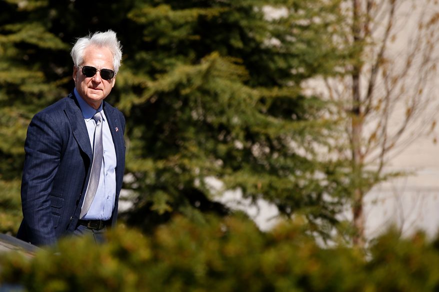 Freedom Watch attorney Larry Klayman leaves the Barrett Prettyman Federal Courthouse in Washington, Thursday, April 2, 2015, after a federal appeals court hearing in an appeal of the dismissal of a Freedom of Information Act (FOIA) request seeking records from the State Department about Israeli war plans and its cyber warfare techniques to New York Times reporter David Sanger when Hillary Rodham Clinton was secretary of state. Freedom Watch wants her private servers seized and to reopen the case. (AP Photo/Andrew Harnik)