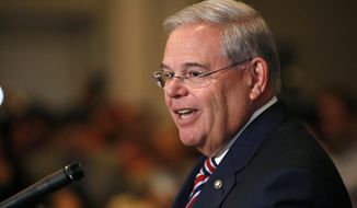 U.S. Sen. Bob Menendez speaks during a news conference, Wednesday, April 1, 2015, in Newark, N.J. Mr. Menendez, the top Democrat on the U.S. Senate Foreign Relations Committee, was indicted on corruption charges, accused of using his office to improperly benefit an eye doctor and political donor. (AP Photo/Julio Cortez)